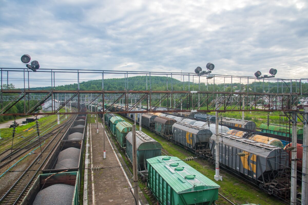 Railway,Wagons,With,Gravel,Parked,On,Sidings.,Freight,Cars,Deliver